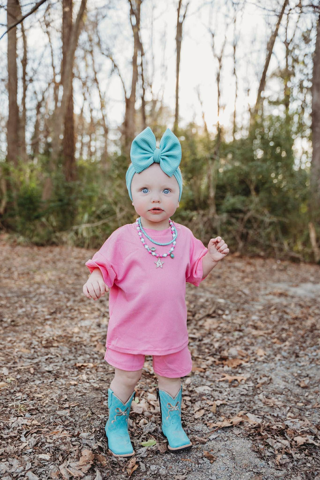 Turquoise Bow Tanner Mark Boots